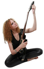 Fototapeta na wymiar curly-haired girl and a guitar isolated