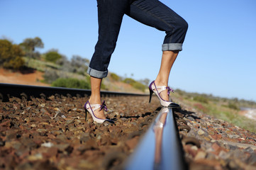 Sexy woman high heels outback Australia railway