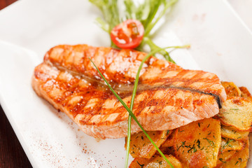 salmon steak with potatoes