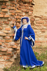 Fototapeta na wymiar Beautiful woman in medieval dress