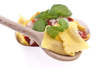 Raviolis on a wooden spoon