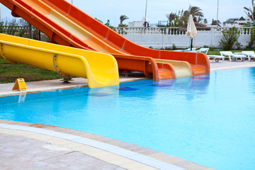 Plastic water slides in the swimming pool