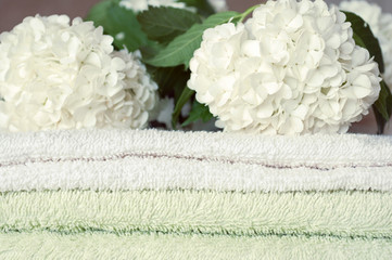 Obraz na płótnie Canvas flower spa. Spa towels with flower