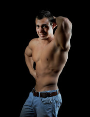 Fototapeta premium Bodybuilder showing his muscles