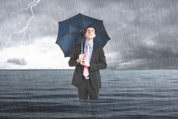 Businessman under the rain
