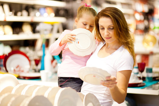 Mother And Daughter Shopping For Homeware