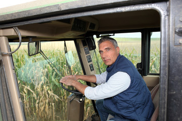 Farmer driving a tractor
