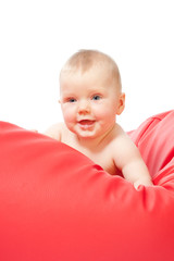 little baby on red sofa