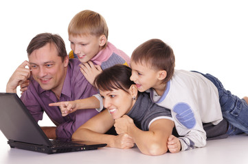 family with laptop