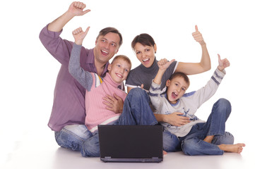 cute family with computer