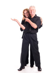 elderly couple posing