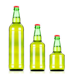 three  green beers bottles of different size . XXL-size