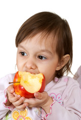 Nice Caucasian daughter with an apple