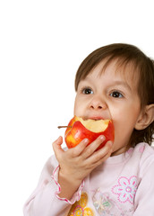 Pretty Caucasian daughter with an apple