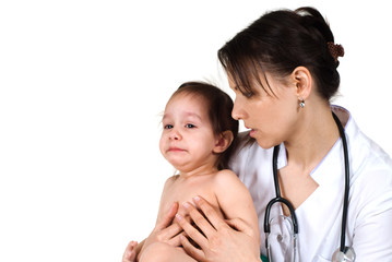 Beautiful happy Caucasian nurse holding a baby girl