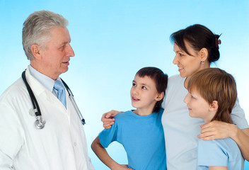 Beautiful Caucasian old doctor with a patient