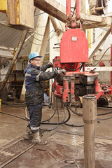 Worker in rig floor