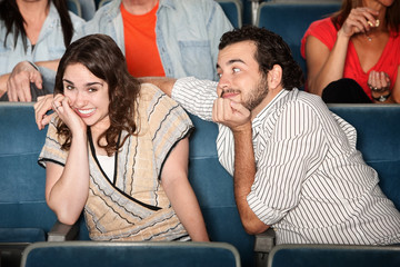 Obraz premium Embarrassed Girl in Theater