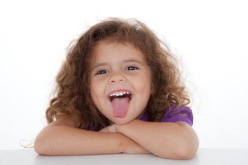 child sticking tongue out © godfer