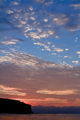 sunset at coast of the sea
