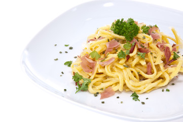 Plate with Cheese Spaetzle isolated on white