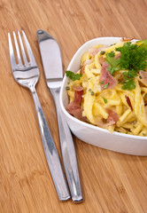 Bowl with Cheese Spaetzle and cutlery