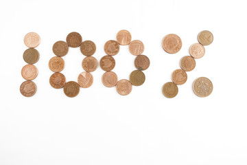 100 % sign made of british pennies