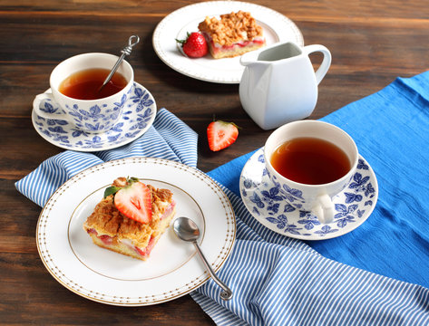 Strawberry Cake And Two Cup Of Tea