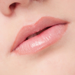 Fototapeta premium Face of beauty young woman. Lips zone