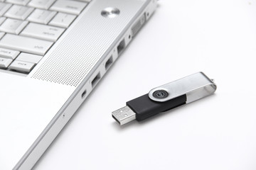 USB thumb drive and a laptop