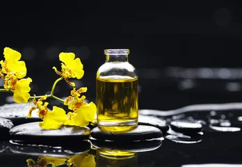 Möbelaufkleber essential oil and branch orchid for aromatherapy © Mee Ting
