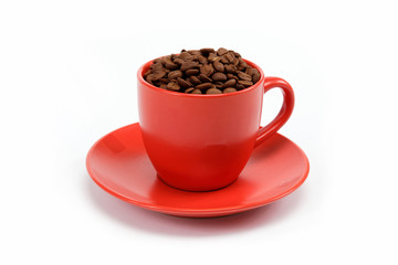 cup with beans coffee on saucer