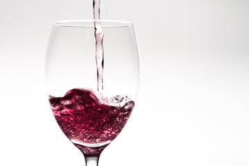 Filling up a wineglass