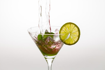 Mixing liquors in a cocktail glass