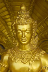 Traditional golden statue of Buddha, Thailand.