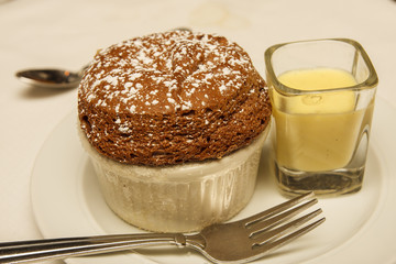 Chocolate Souffle with Vanilla Sauce and Fork