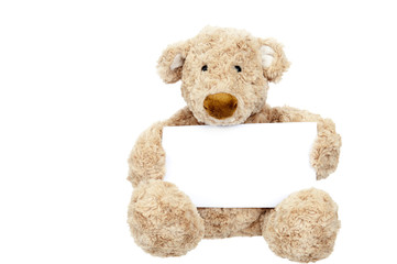 Teddy bear holding an add space