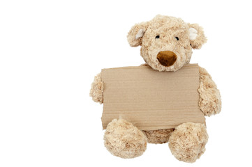 Teddy bear holding an add space