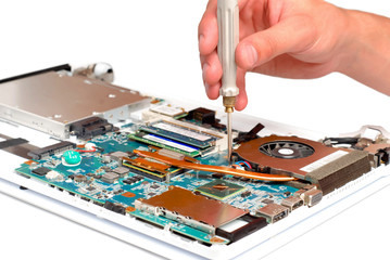 man repair laptop