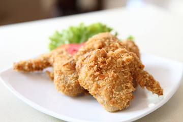 Fried Chicken with tomato vegetable and beer