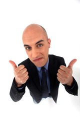 Bald office worker giving thumbs-up