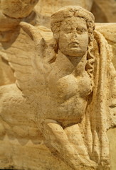 Fototapeta na wymiar Starożytna sfinks wyryte w kamieniu.