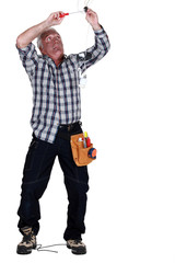 electrician fixing the installation