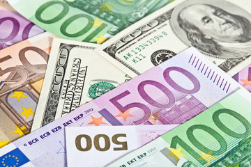 Fototapeta na wymiar Many euro and dollar banknotes