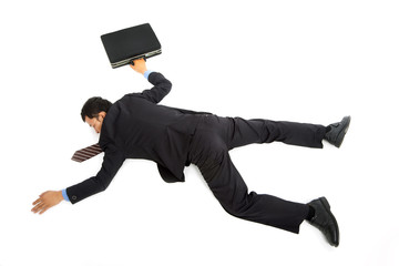 businessman lying down on the ground