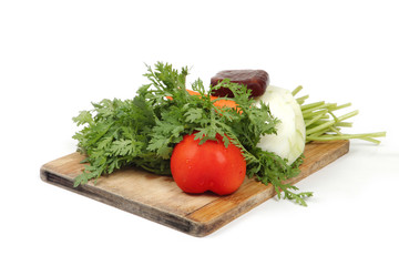 vegetables on hopping block with white background
