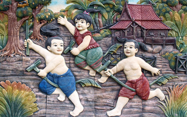 Obraz na płótnie Canvas native culture Thai stucco on the temple wall, Thailand