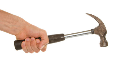 Man holding a old metal hammer
