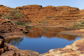 Fototapeta na wymiar reflection of rock mountain in the lake