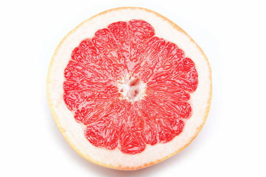 Fresh grapefruit on a white background.